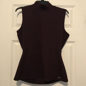 Plum colored Calvin Klein tank.